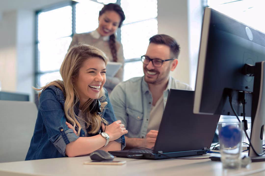 Team collaborating on AI deployments at a desk